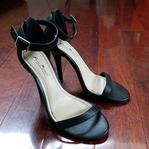 Black stiletto sandal heels